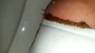She's pooping in white panties
