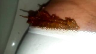 She's pooping in white panties