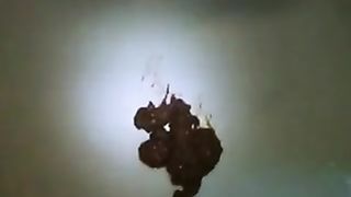 Fingering pussy while shitting