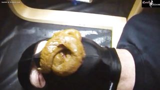 Masked slave forced to eat poop