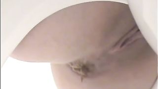 pooping on the toilet girl does a number 2 nice and mushy