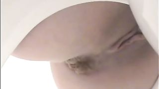 pooping on the toilet girl does a number 2 nice and mushy