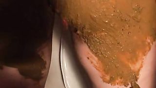 sexy milf poops and rubs the shit over herself
