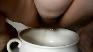mature hairy bbw pissing in a big mug