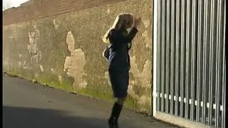 public piss dropping her skirt and taking a pee
