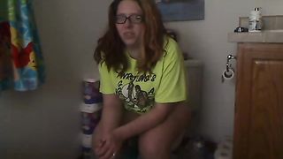 bbw taking a shit on the toilet and films herself