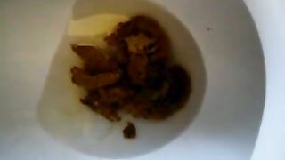 dirty babe showing her ass and pussy while empties her bowel