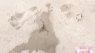 Sexy teen peeing on the beach