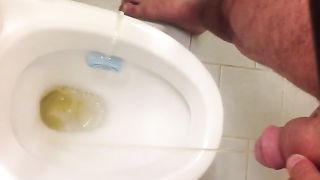 Dude Peeing on the toilet
