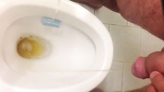 Dude Peeing on the toilet