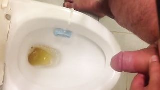 Dude Peeing on the toilet