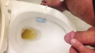 Dude Peeing on the toilet