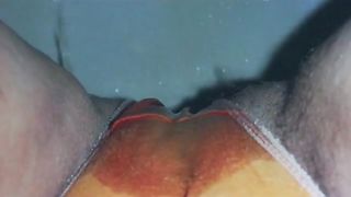 Close up view of a girl peeing in her panty