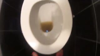 Sexy girl pooping in the toilet