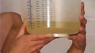Girl measuring her pee