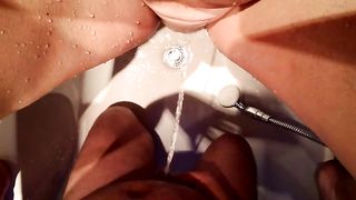 Couple peeing on each other