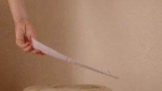 woman with long legs lifts her dress and poops