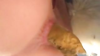 Babe Pooping in a cup