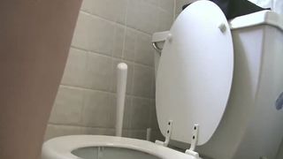 Pierced babe shitting and peeing