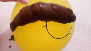 Big turd on yellow balloon