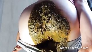 Beautiful college girl shits in grey pants