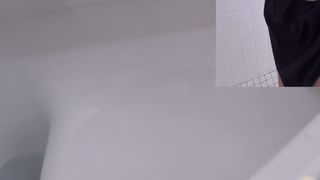 Spying on sexy babe shitting