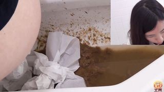 Spying on sexy babe shitting