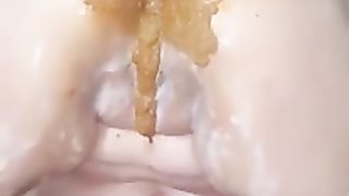 She masturbates with brown shit