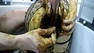 Smearing green shit on girlfriend's ass