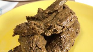 Nerdy babe shitting on yellow plate