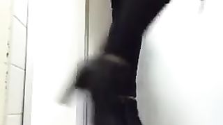 Cute blonde shitting between high heels