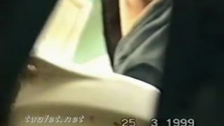 Pushing a big turd over toilet