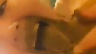 Rubbing poop on entire face