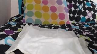 Ebony girl pooping on bed