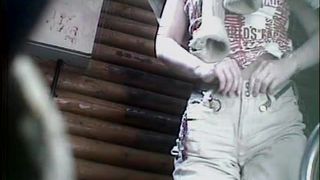 Thai teen using public bathroom