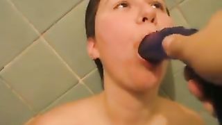 Sucking a dirty dildo