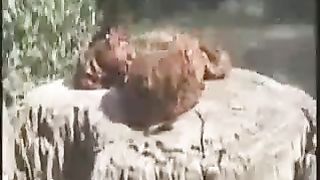 Dark haired teen shits in forest