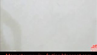 Brown haired beauty shitting