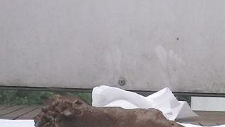 Pushing big turd on white napkin