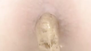 Brown shit over toilet