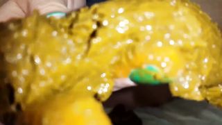 Using a dildo to penetrate her dirty pussy