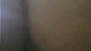 Black babe shits over toilet