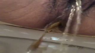 Hairy babe can't stop shitting