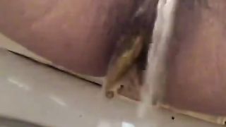 Hairy babe can't stop shitting
