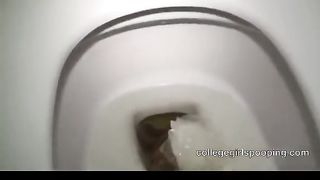Milf shitting a lot in toilet