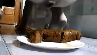 Huge turd on white plate