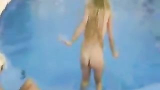 Two blonde girls shit in a pool