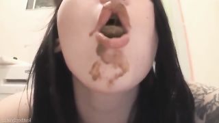 Tattooed babe eats her own shit