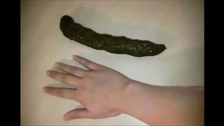 Blonde girl shitting on a table