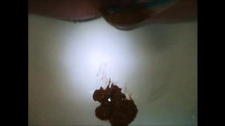 Flat breast girl shit and piss on the blue panty